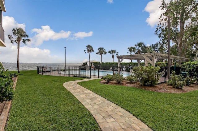 2970 Saint Johns Ave Unit 3F, Jacksonville, FL 32205 - view of yard featuring a pergola, fence, a patio, and a community pool