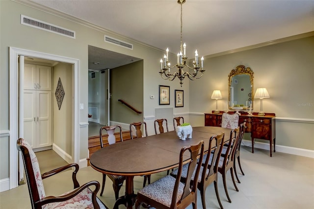 2970 Saint Johns Ave Unit 3F, Jacksonville, FL 32205 - dining room with baseboards, visible vents, and ornamental molding