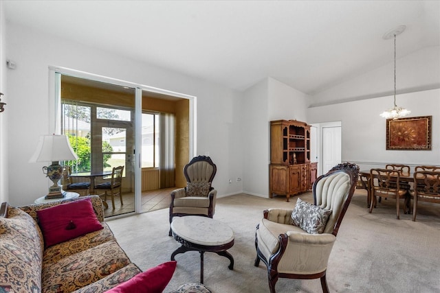 living area with lofted ceiling, an inviting chandelier, and light carpet