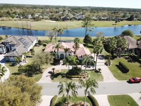 aerial view with a water view and a residential view