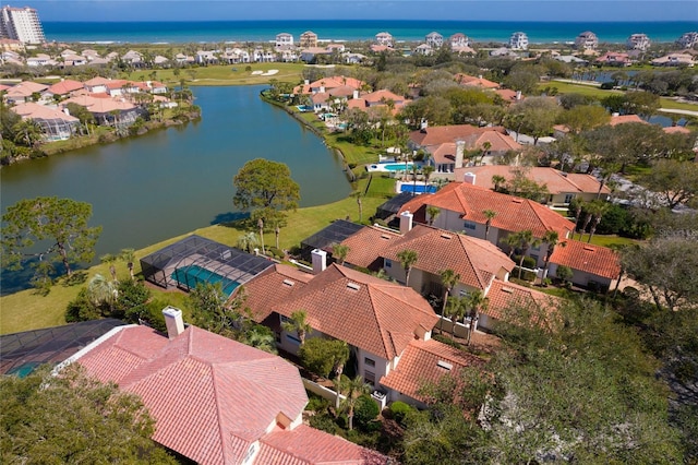 aerial view with a water view and a residential view