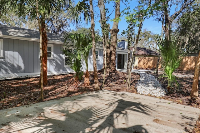 exterior space featuring a patio area and fence