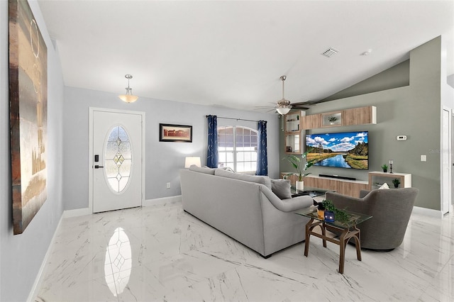 living room with visible vents, baseboards, lofted ceiling, and marble finish floor