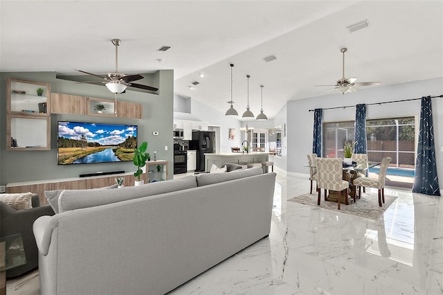 living room featuring visible vents, marble finish floor, and a ceiling fan