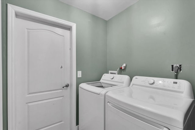 laundry area featuring laundry area and washing machine and clothes dryer