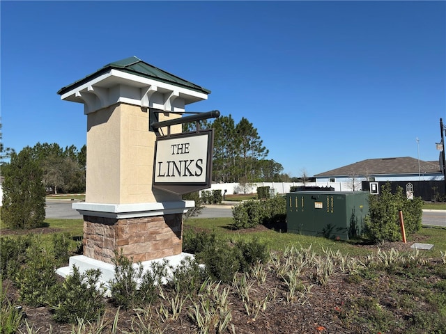 view of community sign