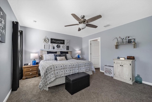 carpeted bedroom featuring baseboards, visible vents, and ceiling fan