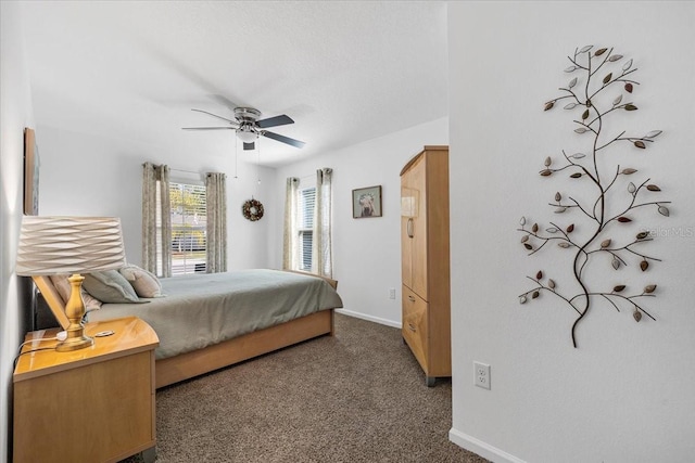 bedroom featuring baseboards, carpet floors, and ceiling fan