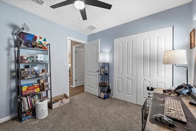 bedroom featuring visible vents, carpet, a closet, and a ceiling fan