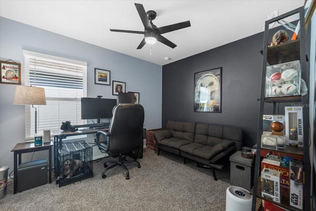 office area with ceiling fan and carpet