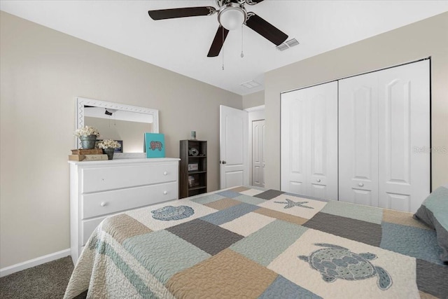 carpeted bedroom featuring a closet, visible vents, a ceiling fan, and baseboards