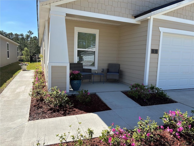 doorway to property featuring covered porch