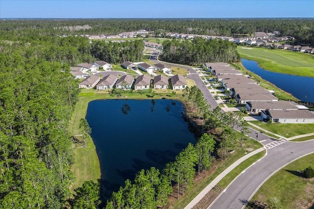 drone / aerial view with a residential view and a water view