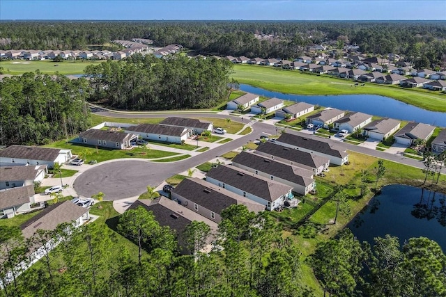 aerial view with golf course view, a water view, and a residential view