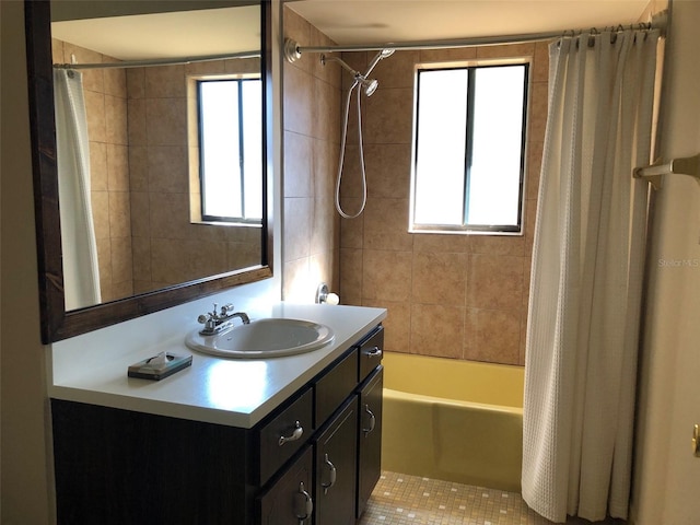 full bath featuring vanity and shower / tub combo