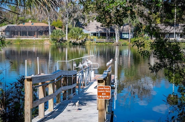 view of dock with a water view