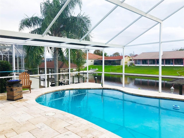 pool featuring a patio, a yard, a water view, a lanai, and a residential view