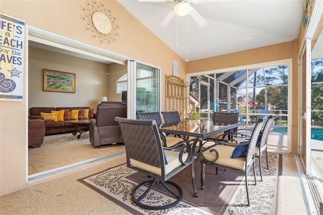 sunroom / solarium with vaulted ceiling and ceiling fan