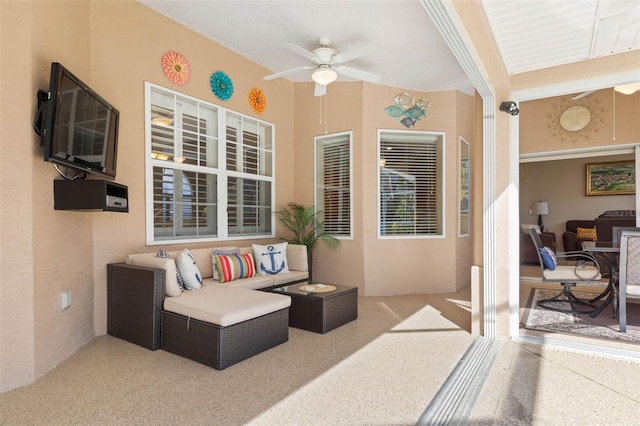 view of patio / terrace featuring a ceiling fan and an outdoor hangout area