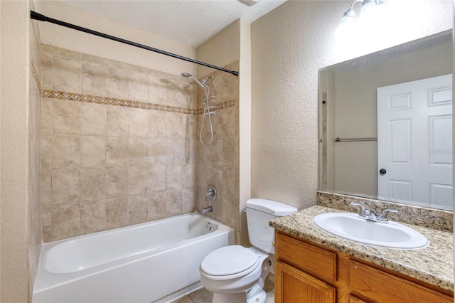 full bath featuring vanity, tub / shower combination, a textured ceiling, toilet, and a textured wall