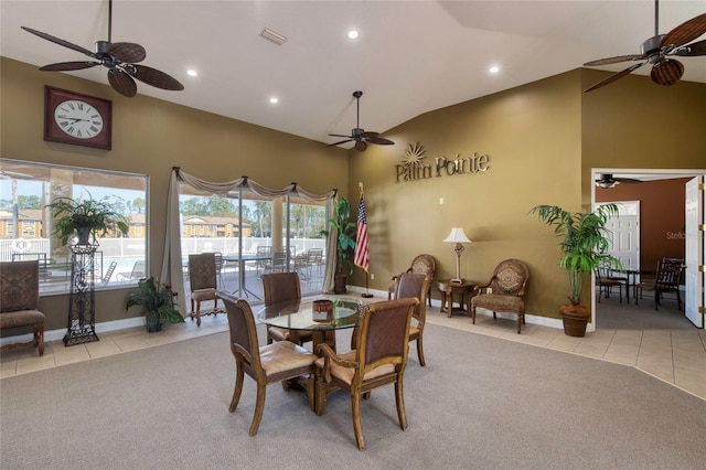 dining space featuring light tile patterned floors and ceiling fan