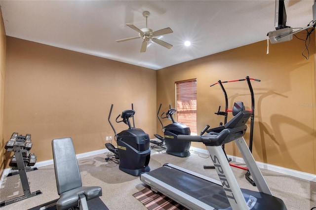 workout room featuring recessed lighting, a ceiling fan, and baseboards