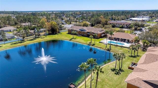 birds eye view of property with a residential view and a water view