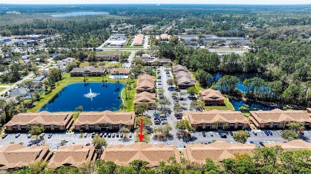 aerial view with a water view and a residential view