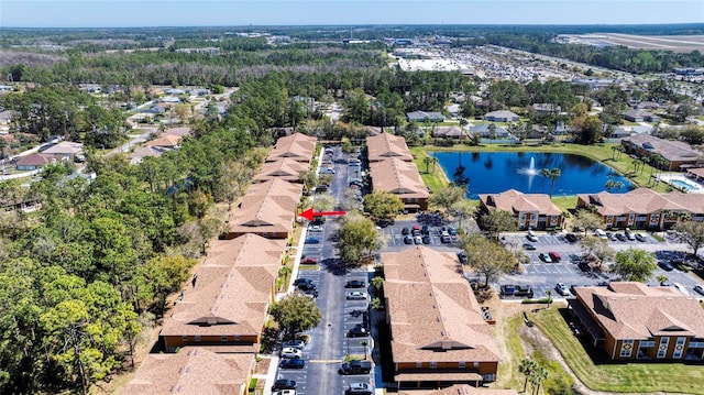 aerial view with a water view and a residential view