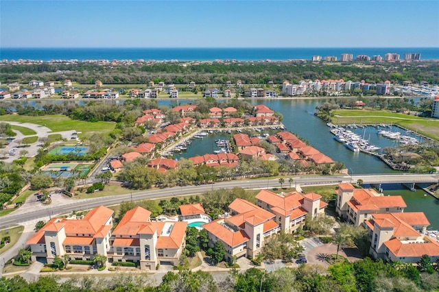 birds eye view of property featuring a water view