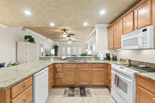 kitchen with white appliances, ornamental molding, a ceiling fan, and a sink