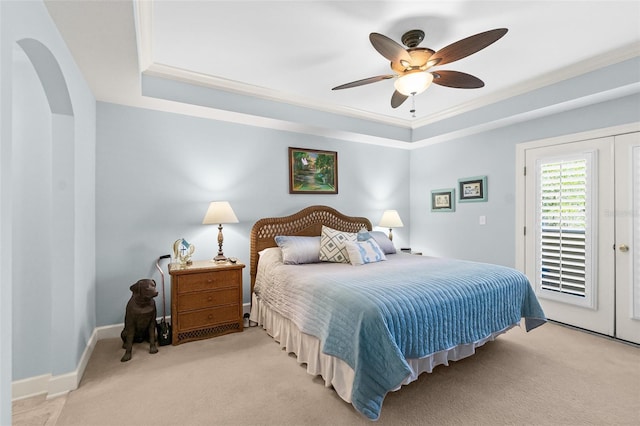 bedroom with access to exterior, light colored carpet, baseboards, and ceiling fan