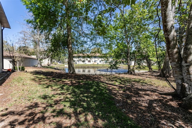 view of yard featuring a water view