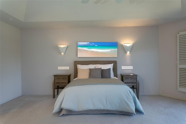 bedroom featuring baseboards and carpet floors