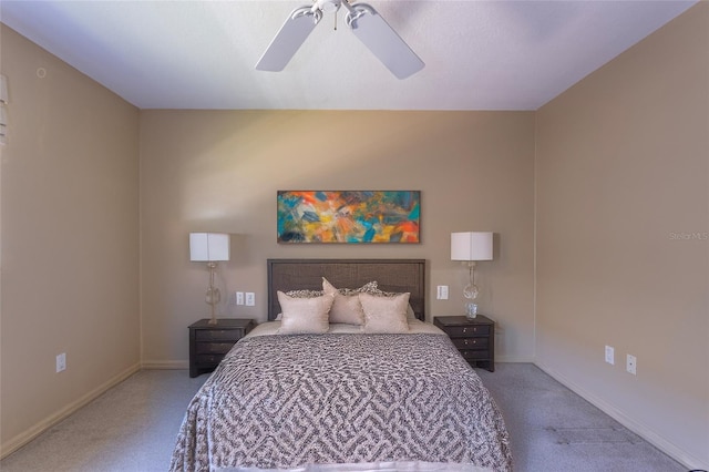 carpeted bedroom with baseboards and ceiling fan