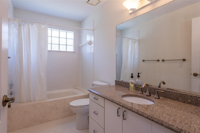 bathroom featuring tile patterned floors, toilet, vanity, and shower / bath combination with curtain