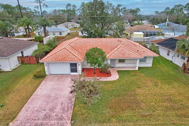 birds eye view of property with a residential view