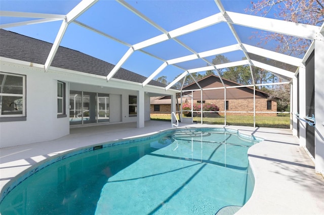 pool with a patio and a lanai