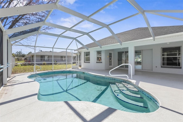 outdoor pool featuring a patio and a lanai