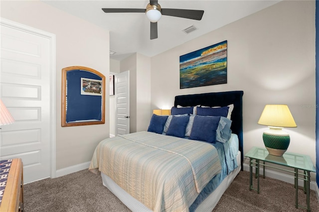 bedroom with visible vents, carpet flooring, a ceiling fan, and baseboards