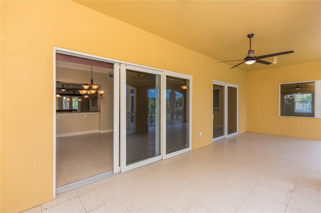 view of patio featuring ceiling fan