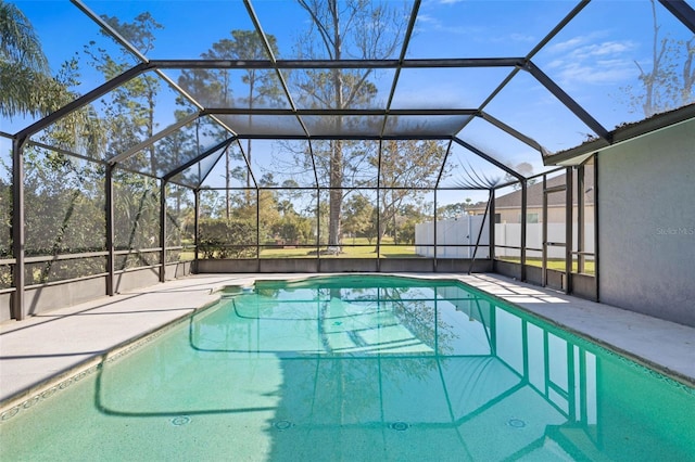 pool featuring a lanai and a patio