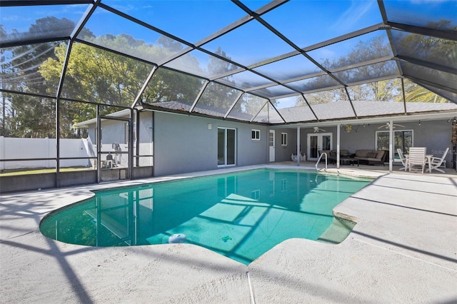 view of pool with a ceiling fan, a patio, fence, a fenced in pool, and an outdoor hangout area