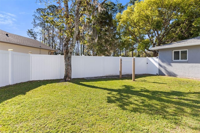 view of yard featuring a fenced backyard