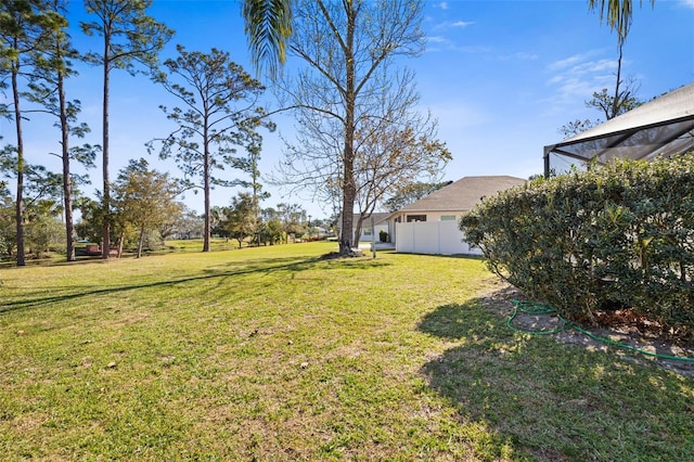 view of yard with fence