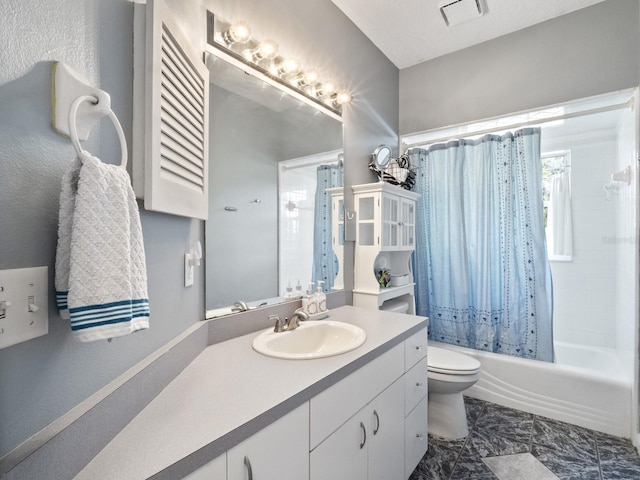 full bathroom featuring visible vents, toilet, vanity, and shower / bath combo