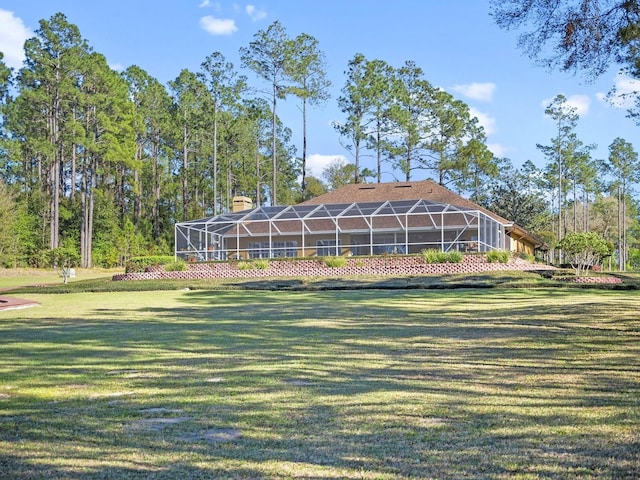 view of home's community featuring a lawn