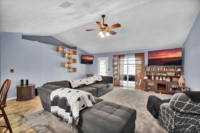 living room with visible vents, a ceiling fan, and vaulted ceiling