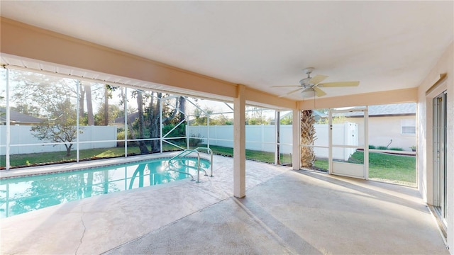 view of pool featuring a fenced in pool, ceiling fan, a lanai, a fenced backyard, and a patio area