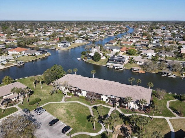 aerial view featuring a residential view and a water view